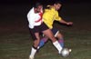 Winson Elegodlda of Bateman(left) and Hector Marles of Maidstone(right) fighting for the ball