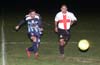  Albeiro Betancur of Tuxpan(left) and Carlos Torres of Bateman(right) racing for the ball