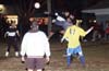 All going for the ball, Gerber Garcia(left) of Maidstone, Dario Garcia(center) Casual keeper, and Rodolfo Marin of Casual(rear)