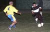 Vanderley Silverio of Casual running to steal the ball away from Gehider Garcia of Maidstone(right)