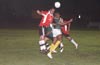 Luis Vas of Tortorella(left) and Dwight Amade of Bayberry going for the ball