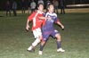 Steven Orrego(rear) of Tortorella and Andy Gonzales of Maidstone running to head the ball