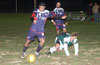Gehider Garcia of Maidstone about to get by Jeff Esposito of Bayberry(on the ground)