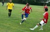 Eddie Lopez of Tortorella trapping the ball in front of Steven Orrego