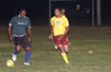 Dwight Amade of Espo(left) guarding the ball from Cesar Galea of Hamptons