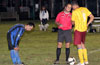 Alex Ramierz(center) telling Cesar Galea of Hampton's the overtime rules while Luis Correa of Maidstone fixes his socks