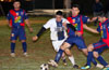 Mario Robles of ED-Tuxpan(center) fighting for the ball with Jon Lizano of Batemen(right) and Juan Velazquez of ED-Tuxpan(right) to the ball