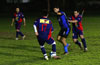 Gehider Garcia of Maidstone(center) controlling the ball between Uchupie Esteban(front) and Reynaldo Yanes of ED-Tuxpan