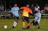 As the ball approaches John Romero of Maidstone(center) Jon Lizano(left) and Diego Guazhambo try to steal the ball