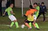 Will Luis Correa of Maidstone Market(center) dribbling past Ivan Espinoza(left) and Juan Velazquez of FC Tuxpan