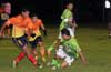 Will Alberto Larios of FC Tuxpan(right) be able to protect the ball from Gehider Garcia(left) and Cesar Correa of Maidstone Market