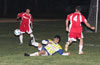 A FC Tuxpan forward clearing the ball out of danger