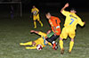 Ivan Espinoza of FC Tuxpan sliding to steal the ball from Oscar Reinoso of Hampton FC