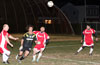 Marciel Correa of Maidstone(black) running past Leslie Czeladko(left) and Cristian Munoz to hit the ball into the net
