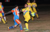 Marco Bautista of The Hideaway(left) running past Carlos Portillo of FC Tuxpan