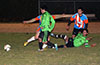 Martin Zuniga(left) and Antonio Ibarra of Hampton FC sliding to block the shot by Cristian Rojo(rear) as Marco Batista looks on
