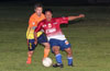 Nettie Sanchez of FC Tuxpan(front) protecting the ball from Andy Gonzales of Maidstone Market