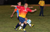 Ivan Espinoza of FC Tuxpan(front) watching the ball as Christian Bautista of The Hideaway tries to kick it away