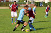 Julian Munoz of Bateman Painting(left) and Carlos Torres of Maidstone Market fighting for the ball