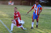 Cristian Duran(left) of Tortorella Pools trying to save the ball from going out as Edwin Robles of The Hideaway looks on