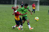 Cristian Gonzales of Hampton FC holding off Ivan Espinoza of FC Tuxpan