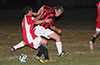 Cesar Correa of Tortorella Pools(front) and Fabian Arias of Cuenca FC going for the ball