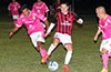 Esteban Uchupaille of Cuenca FC(center) being squeezed by Alberto Carreto and Ivan Espinoza of FC Tuxpan