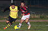 Carlos Portillo of Bateman Painting(left) about to get by Marco Bautista of Cuenca FC