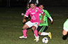 Jos Gutierrez of FC Tuxpan(front) holding off Jonathan Giraldo of Hampton FC