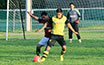 Jean Barientos of Bateman Painting(right) protecting the ball from Cesar Bautista of Cuenca FC
