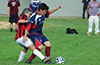 Fabian Arias of Cuenca FC(left) trying to steal the ball from  Ernesto Valverde of Maidstone