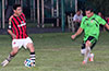 Marco Bautista of Cuenca FC(left) about to pass the ball past Roger Quiceno of Hampton FC