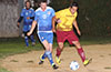 Who will get the ball first, James Brennam of Bateman(left) or Alberto Carreto of FC Tuxpan