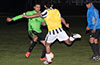 Gehider Garcia of Hampton(rear) about to block the shot by Alex Lira of Sag Harbor United