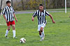 Oscar Murrilo of Sag Harbor(center) about clear the ball before Brian Rojas(right) can get it