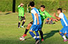Gehider Garcia of Hampton FC protecting the ball from Esteban Uchupaille(left) and Cristian Gonzalez of Tortorella