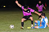Andres Perez of FC Tuxpan(left) protecting the ball from the sliding tackle by Eddie Lopez of Tortorella Pools