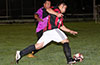Jose Balo of Sag Harbor(front) about to dribble past Alberto Castro of FC Tuxpan