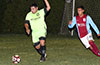 Miguel Bautista of FC Tuxpan(left) watching the ball as Maidstone Market defender Angel Garces is about to challenge him
