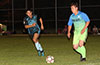 Alberto Carreto of FC Tuxpan(right) about to get by Jonathan Lizano of Bateman Painting