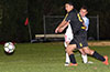 Gehider Garcia(front) of Hampton FC about to get by Juan Chavez of Sag Harbor