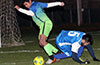 Wilber Flores of FC Tuxpan(left) getting over a slide tackle by Rodolfo Marin of Tortorella Pools