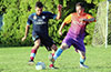 Michael Rincon of Bateman Painting(left) and Luis Munoz of FC Tuxpan fighting for the ball