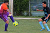Miguel Bautista of FC Tuxpan trapping the ball in front of Romulo Tubatan of Bateman Painting