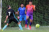 A ball pasted into the center of the FC Tuxpan goal, Santos of Bateman(left) and Gutierrez and Carreto of FC Tuxpan