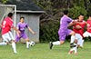 Action in front of the Sag Harbor goal, Sag Harbor(red), FC Tuxpan(purple)