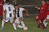 Francisco Bonilla of Sag Harbor(center) sliding to prevent Cristain Compuzano(right) of FC Tuxpan the ball