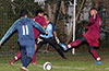 Antonio Padilla of Maidstone(front) taking a shot in front of the East Hampton SC goal