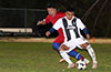 Jeremias Simon of Sag Harbor(front) about to get by Alberto Carreto of FC Tuxpan