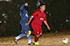 Cristian Compuzano of FC Tuxpan(right) on the attack